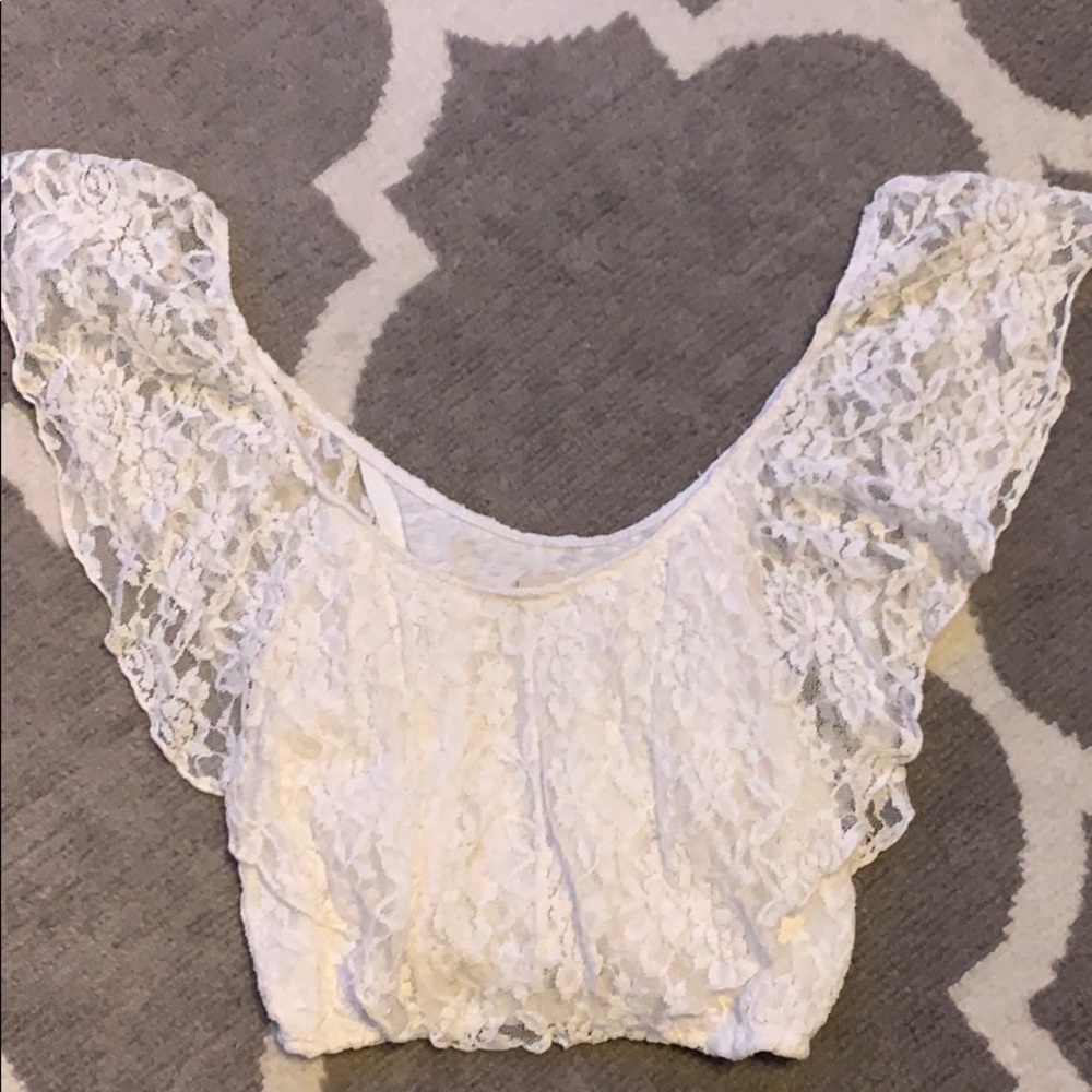 Off the shoulder white lace crop top.